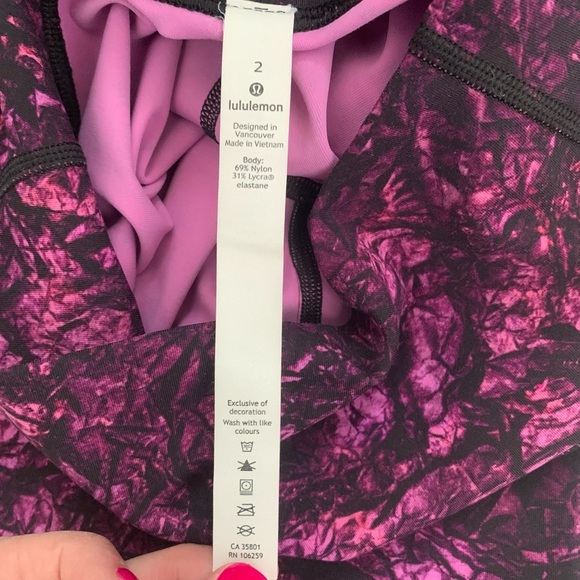 Lululemon Speed Up Tight 28” Leggings in Deep Pink/Purple and Black. Size 2. - Picture 2 of 6